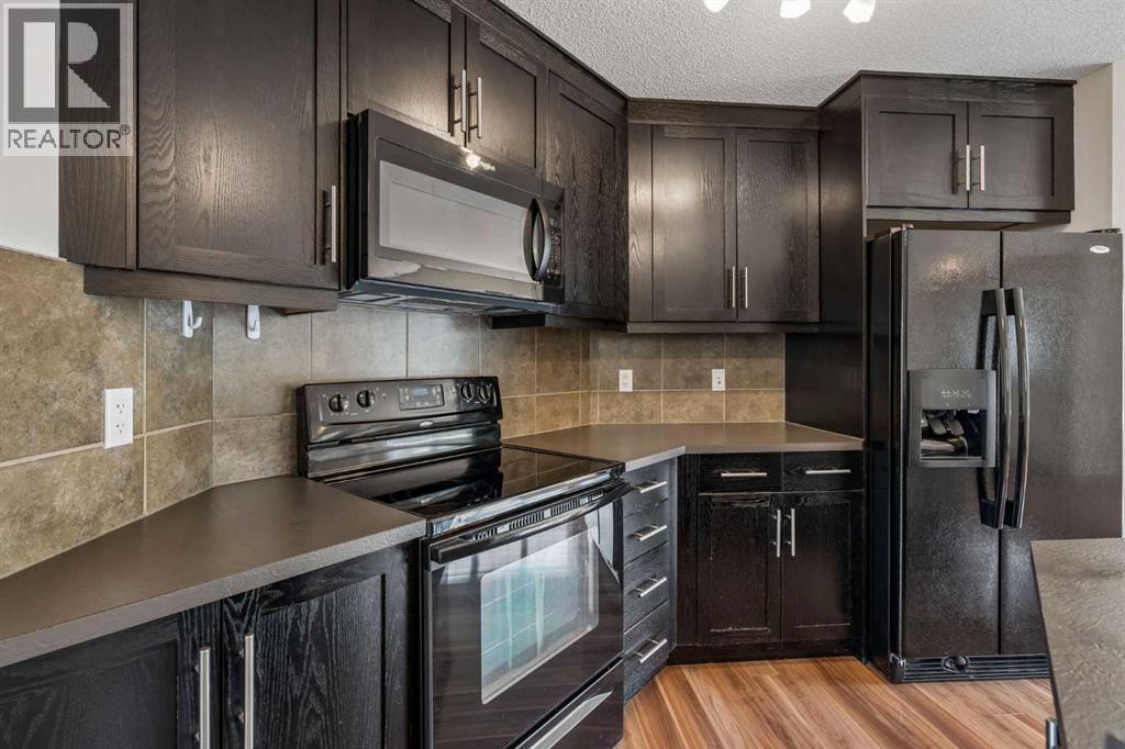 175 Panamount Way NW, Calgary, Alberta  T3K 0S8 - Photo 8 - A2333602