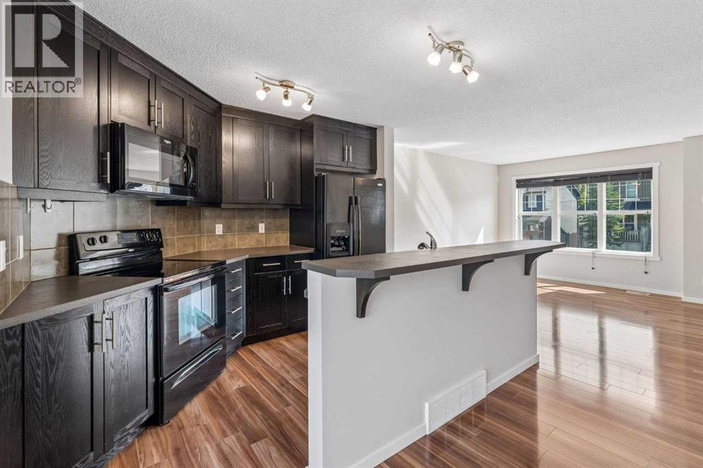 175 Panamount Way NW, Calgary, Alberta  T3K 0S8 - Photo 7 - A2333602