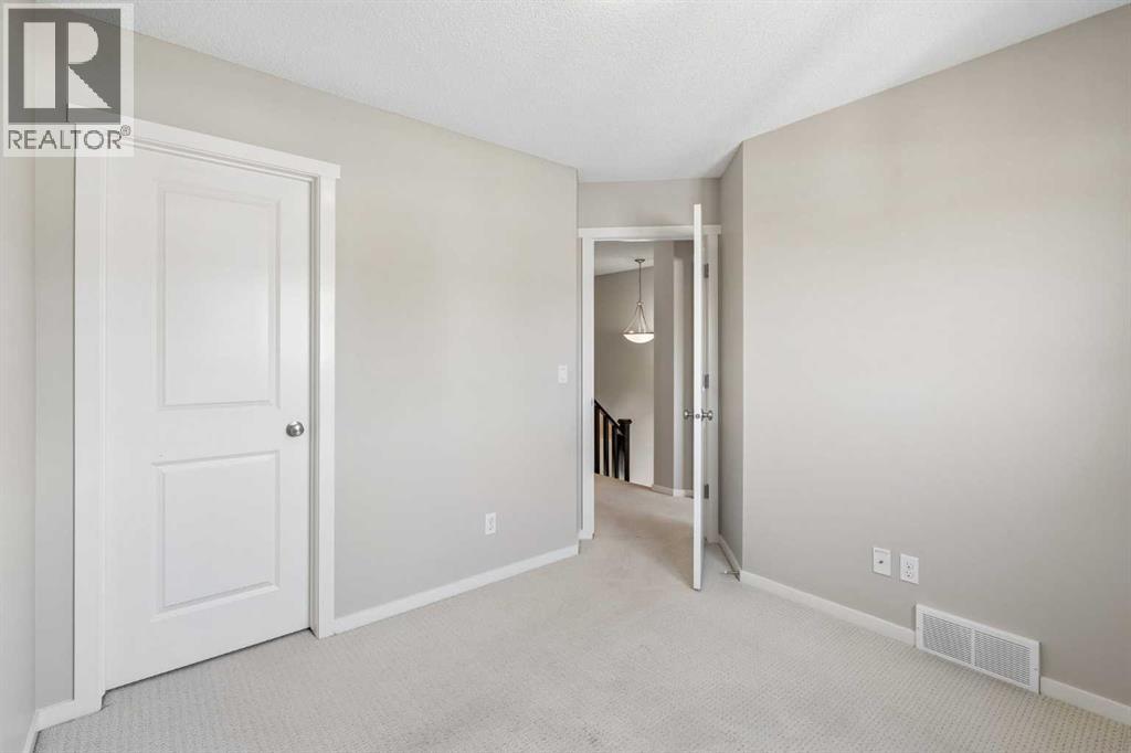 175 Panamount Way NW, Calgary, Alberta  T3K 0S8 - Photo 19 - A2333602