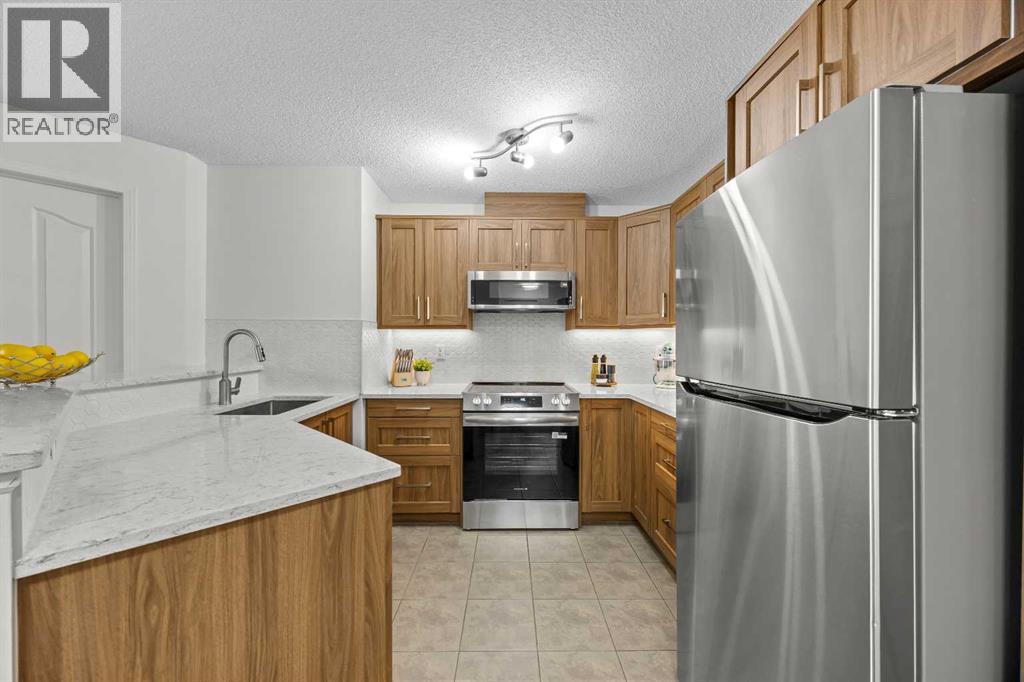 5210, 16969 24 Street SW, Calgary, Alberta  T2Y 0J8 - Photo 2 - A2334283