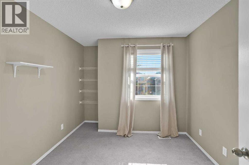 706 Everridge Drive SW, Calgary, Alberta  T2Y 4W5 - Photo 17 - A2334297