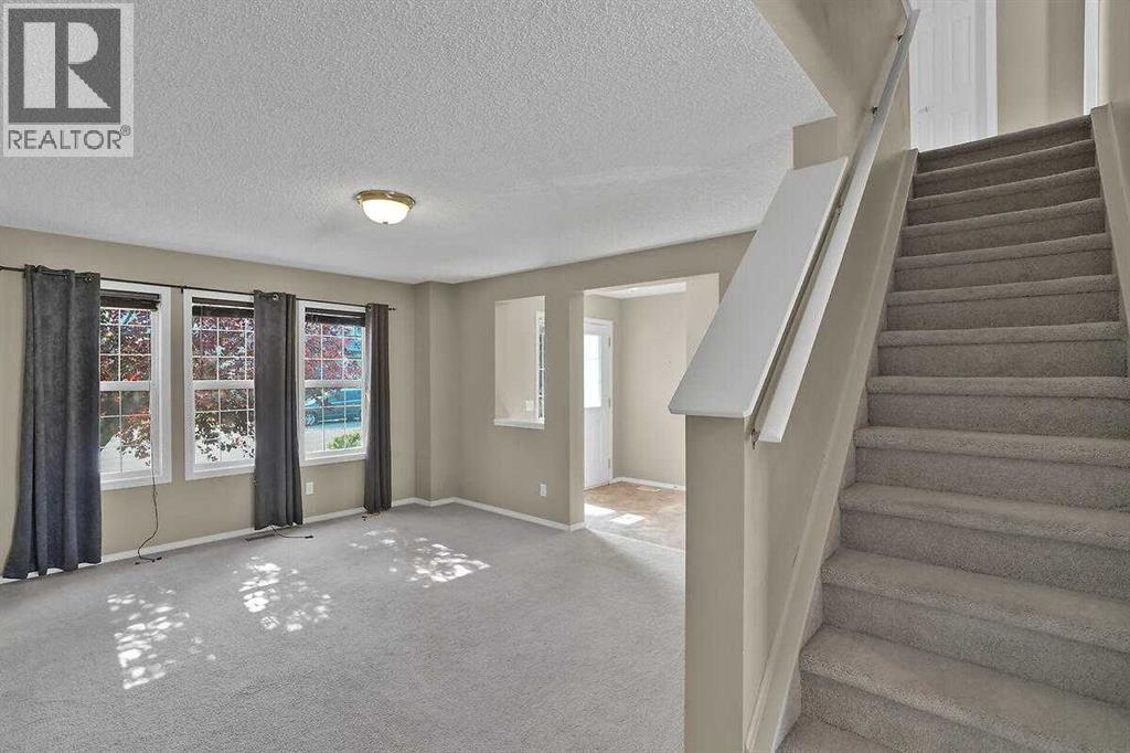 706 Everridge Drive SW, Calgary, Alberta  T2Y 4W5 - Photo 8 - A2334297