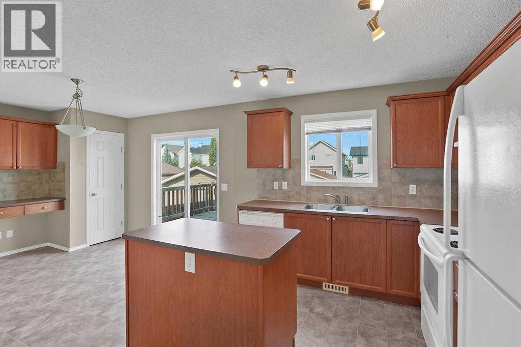 706 Everridge Drive SW, Calgary, Alberta  T2Y 4W5 - Photo 9 - A2334297