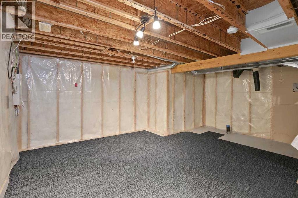706 Everridge Drive SW, Calgary, Alberta  T2Y 4W5 - Photo 27 - A2334297