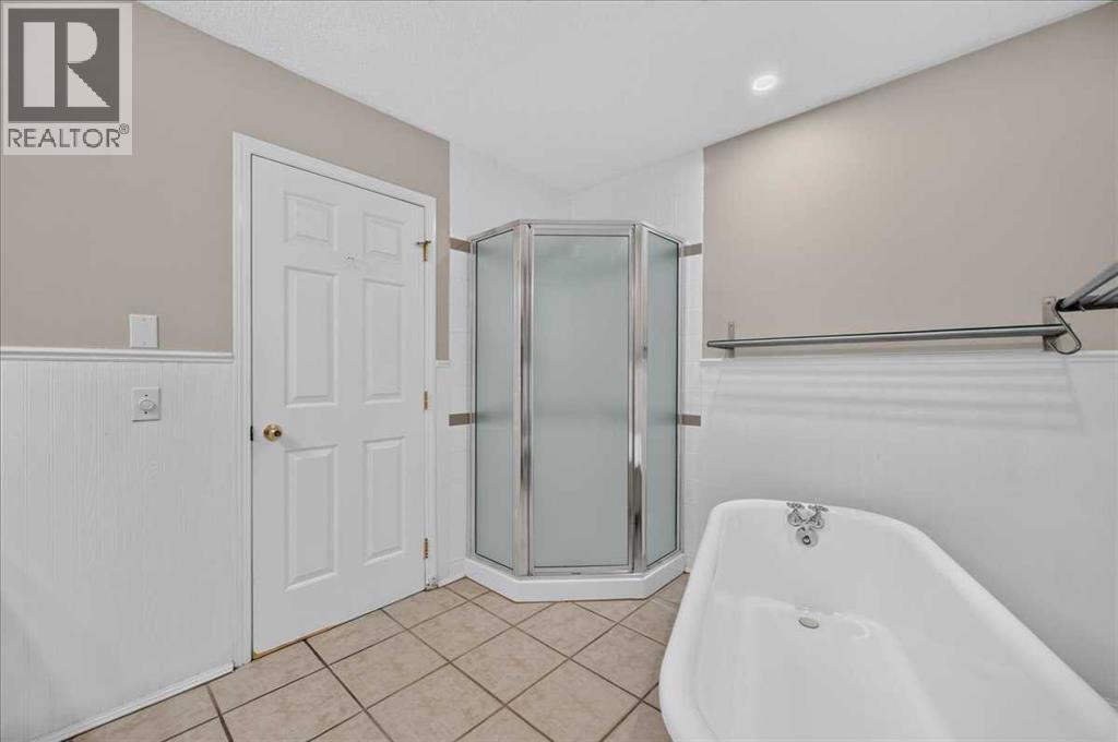 21 Strathearn Gardens SW, Calgary, Alberta  T3H 2R1 - Photo 18 - A2334898