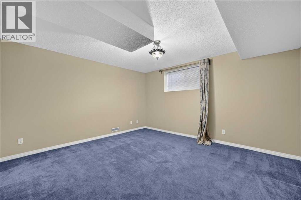 21 Strathearn Gardens SW, Calgary, Alberta  T3H 2R1 - Photo 22 - A2334898