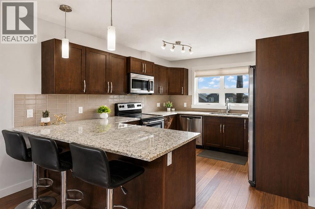 230 Covecreek Circle NE, Calgary, Alberta  T3K 0W6 - Photo 3 - A2335242
