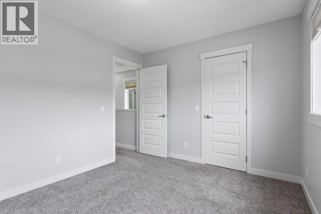 230 Covecreek Circle NE, Calgary, Alberta  T3K 0W6 - Photo 19 - A2335242