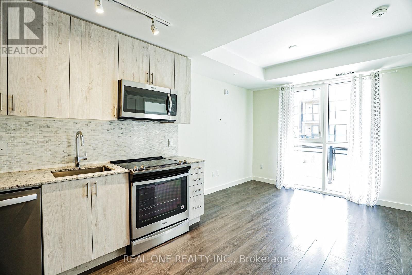 209 - 150 Sabina Drive, Oakville (Go Glenorchy), Ontario  L6H 0W3 - Photo 3 - W13645660