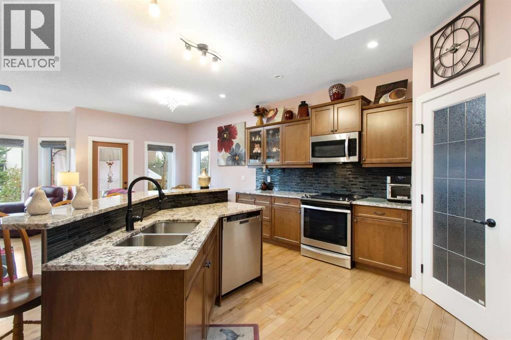 504 Harrison Court, Crossfield, Alberta  T0M 0S0 - Photo 9 - A2313641