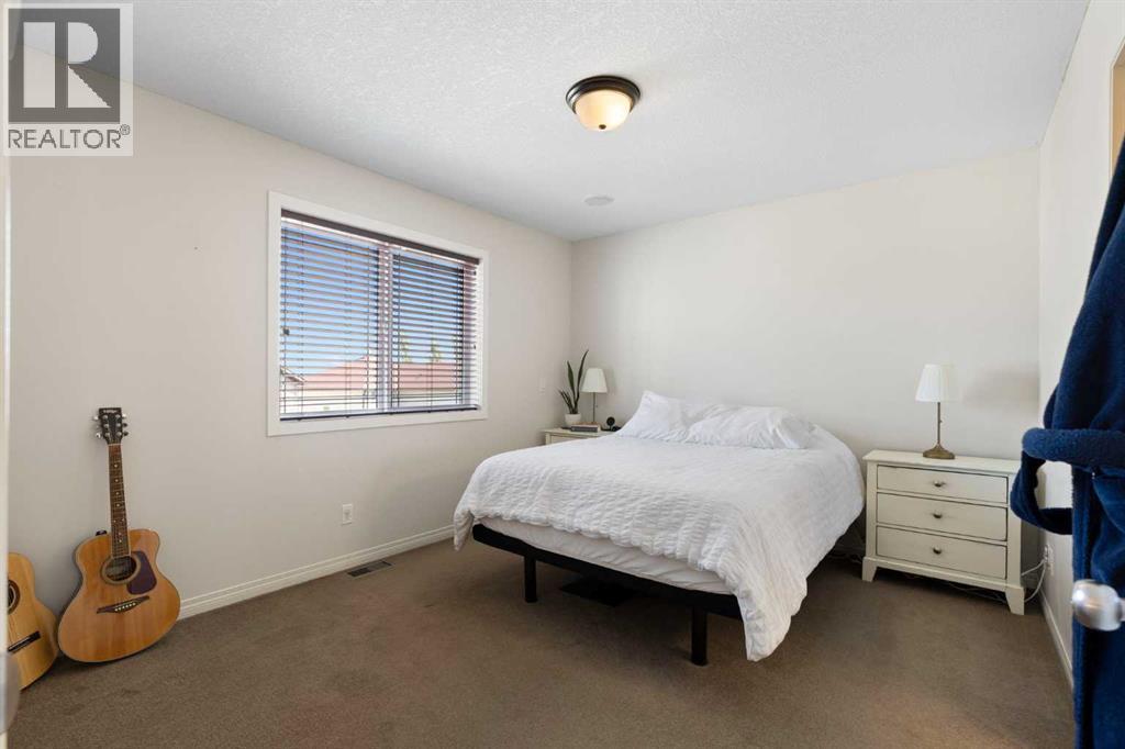 590 Coopers Drive SW, Airdrie, Alberta  T4B 3M4 - Photo 24 - A2329843