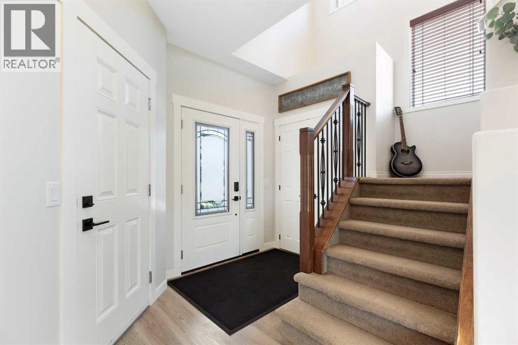 590 Coopers Drive SW, Airdrie, Alberta  T4B 3M4 - Photo 4 - A2329843
