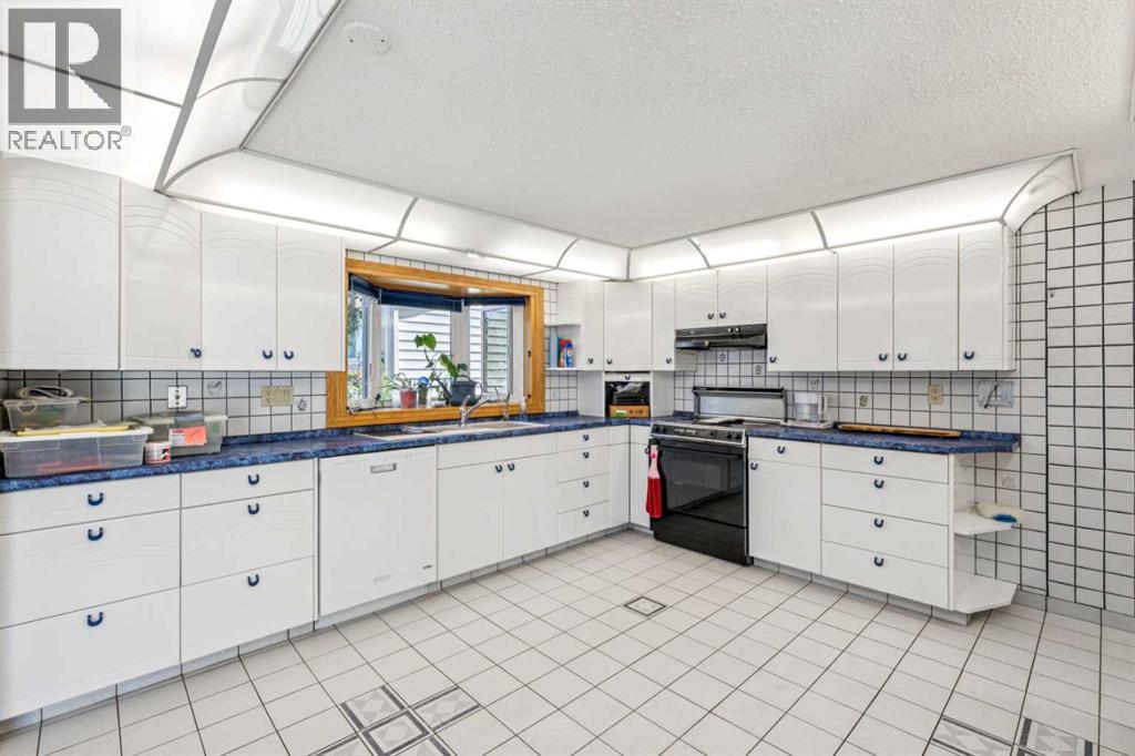 4819 Rundlewood Drive Ne, Calgary, Alberta  T1Y 1B2 - Photo 7 - A2329273