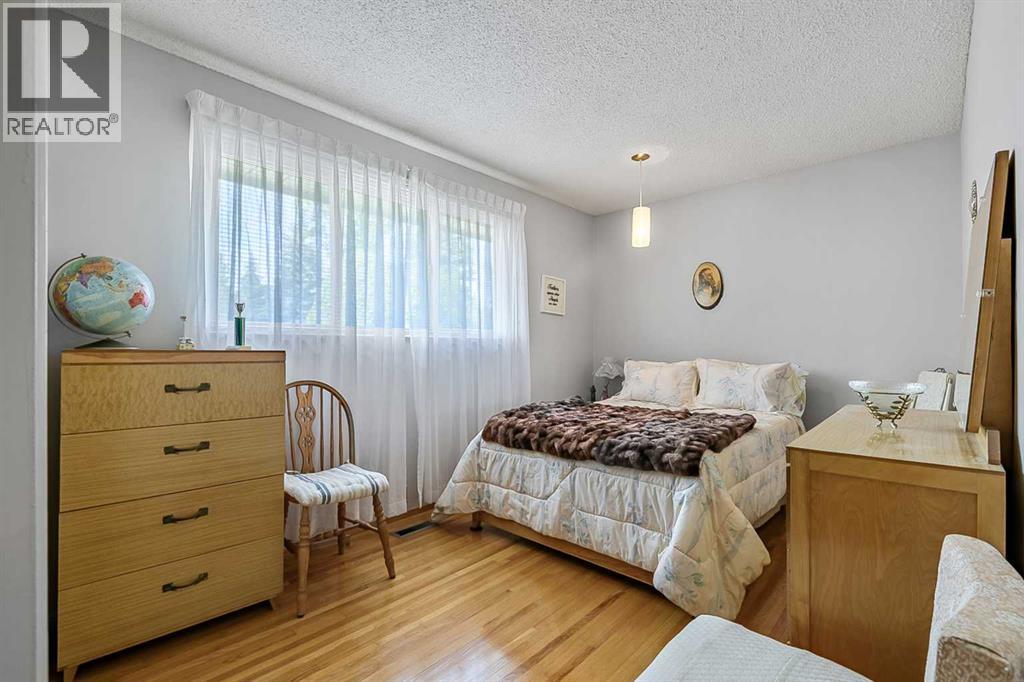 832 Canna Crescent SW, Calgary, Alberta  T2W 1N9 - Photo 12 - A2334420