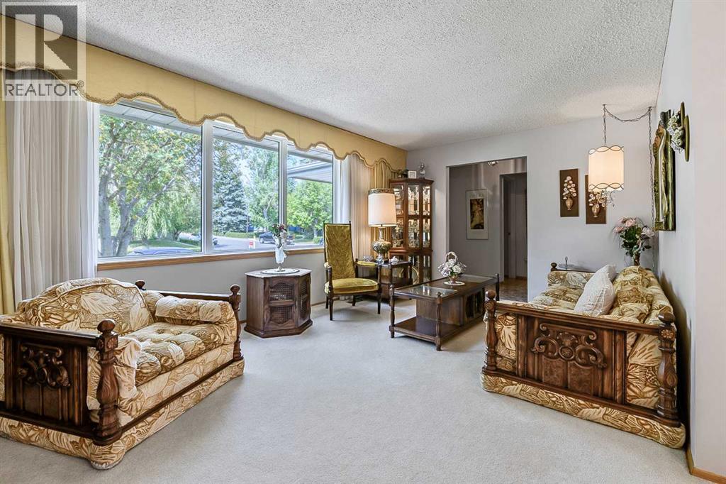 832 Canna Crescent SW, Calgary, Alberta  T2W 1N9 - Photo 4 - A2334420