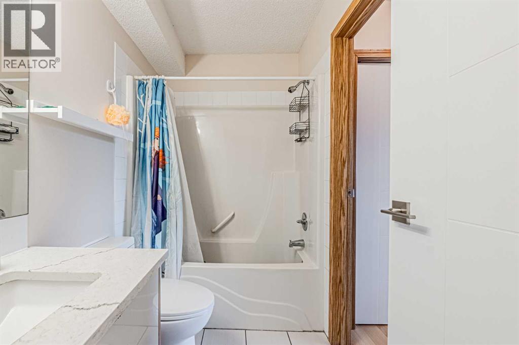 65 Martinvalley Road NE, Calgary, Alberta  T3J 4L9 - Photo 12 - A2335350
