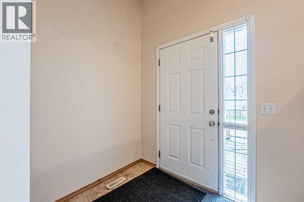 65 Martinvalley Road NE, Calgary, Alberta  T3J 4L9 - Photo 4 - A2335350