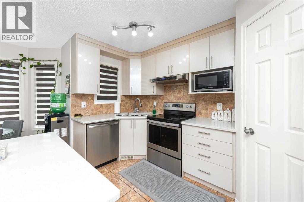 210 Taracove Landing NE, Calgary, Alberta  T3J 4R5 - Photo 12 - A2334351