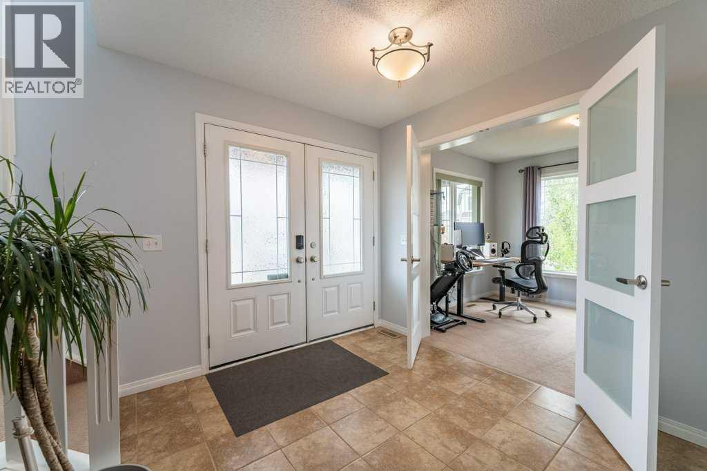 15 Windwood Grove SW, Airdrie, Alberta  T4B 3T2 - Photo 3 - A2321440