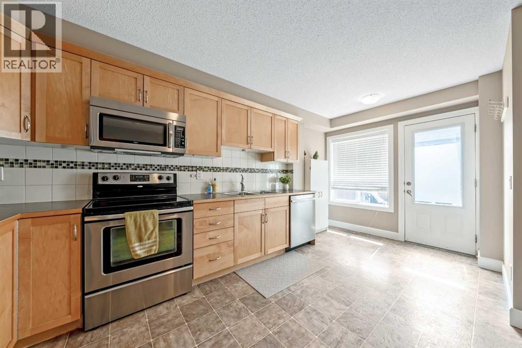 1333 Windstone Road SW, Airdrie, Alberta  T4B 0N7 - Photo 6 - A2333573