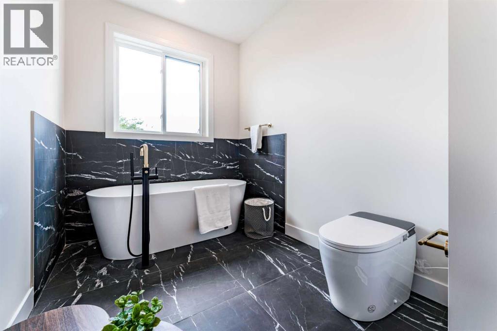 812 1 Street NW, Calgary, Alberta  T2M 2R7 - Photo 32 - A2334040