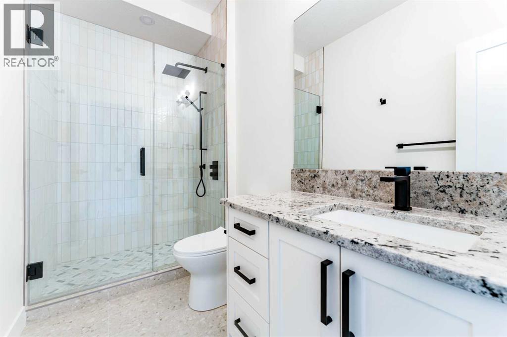 812 1 Street NW, Calgary, Alberta  T2M 2R7 - Photo 37 - A2334040