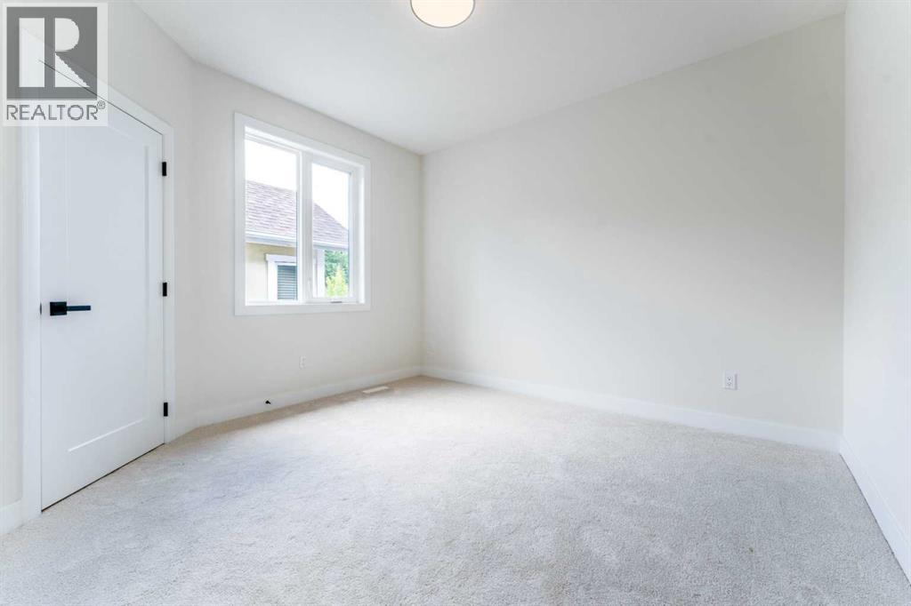 812 1 Street NW, Calgary, Alberta  T2M 2R7 - Photo 38 - A2334040
