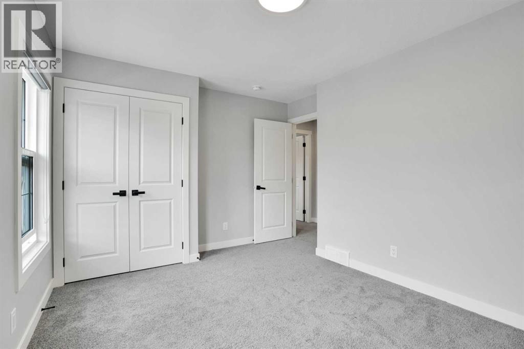 289 Ambleside Avenue NW, Calgary, Alberta  T3P 1W3 - Photo 10 - A2329396