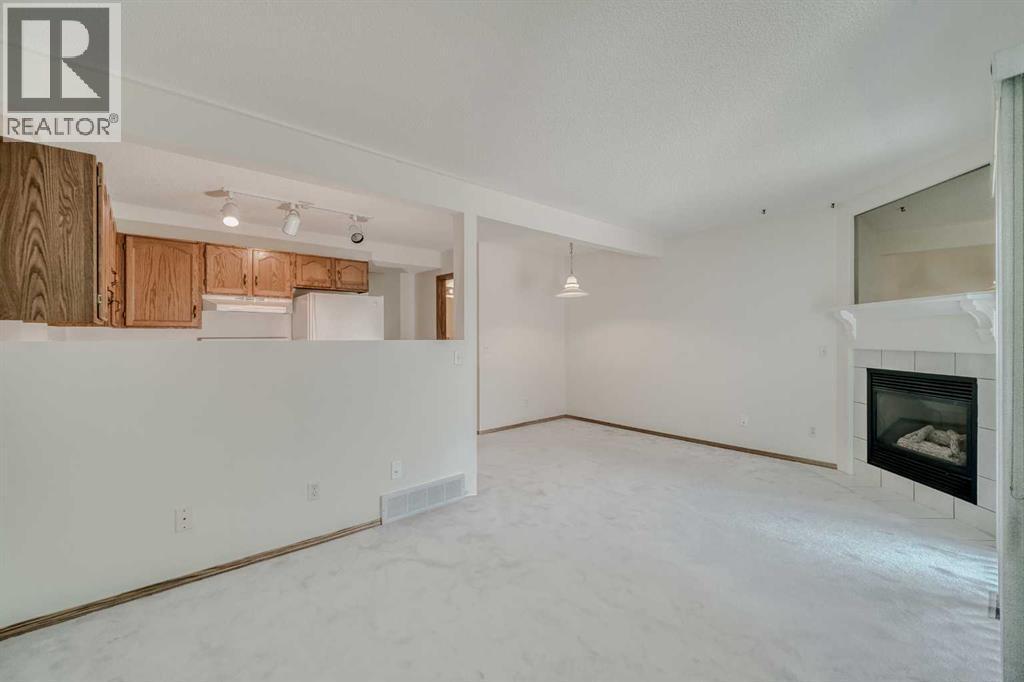 15 Harvest Glen Heights NE, Calgary, Alberta  T3K 4L3 - Photo 8 - A2334476