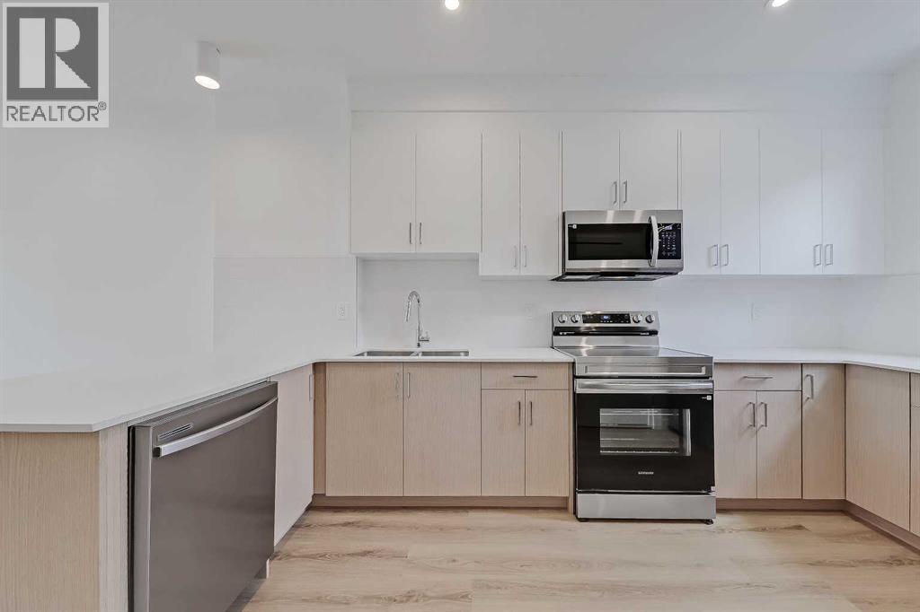 107, 3550 45 Street SW, Calgary, Alberta  T3E 3V2 - Photo 5 - A2322534