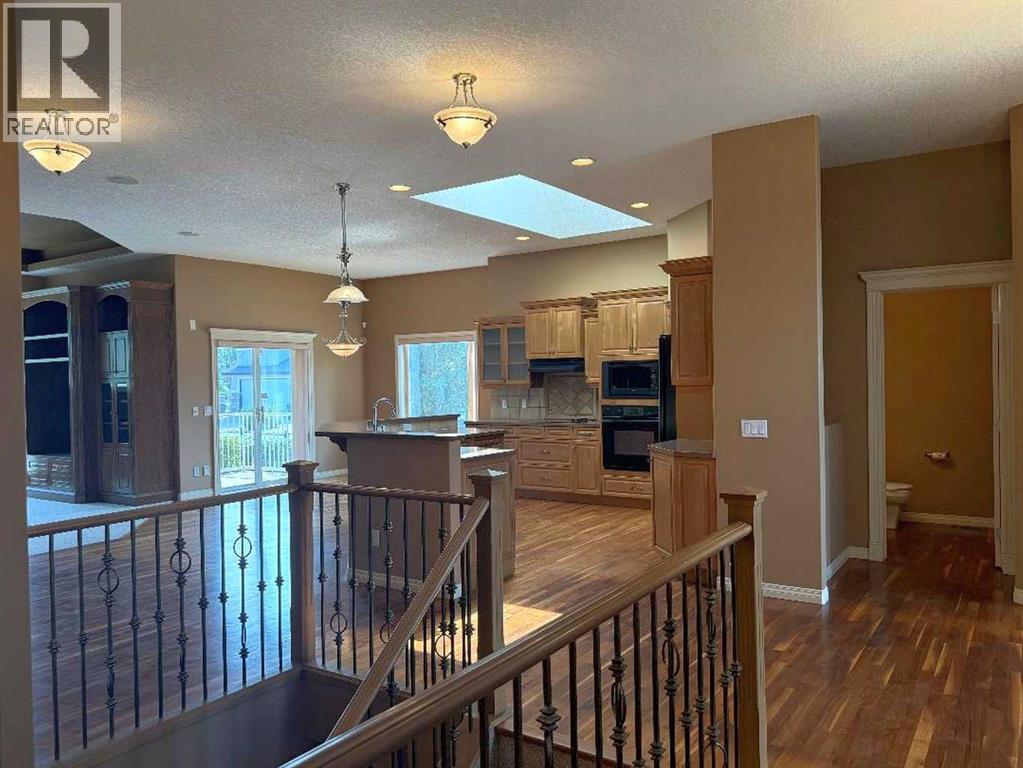 157 Valley Creek Place NW, Calgary, Alberta  T3B 5V1 - Photo 3 - A2334554