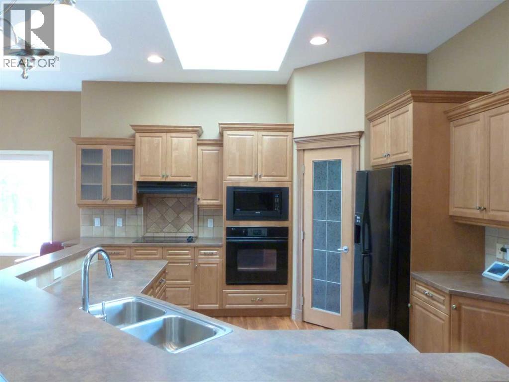 157 Valley Creek Place NW, Calgary, Alberta  T3B 5V1 - Photo 7 - A2334554