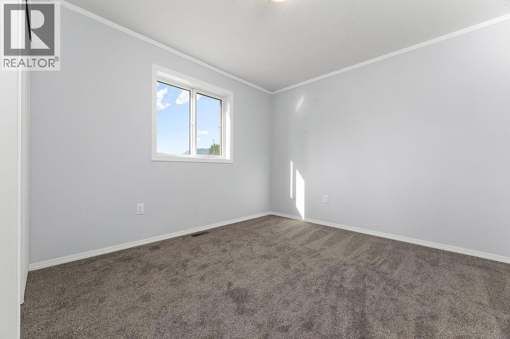 8948 Rundle Place, Canal Flats, British Columbia  V0B 1B0 - Photo 16 - 10396815