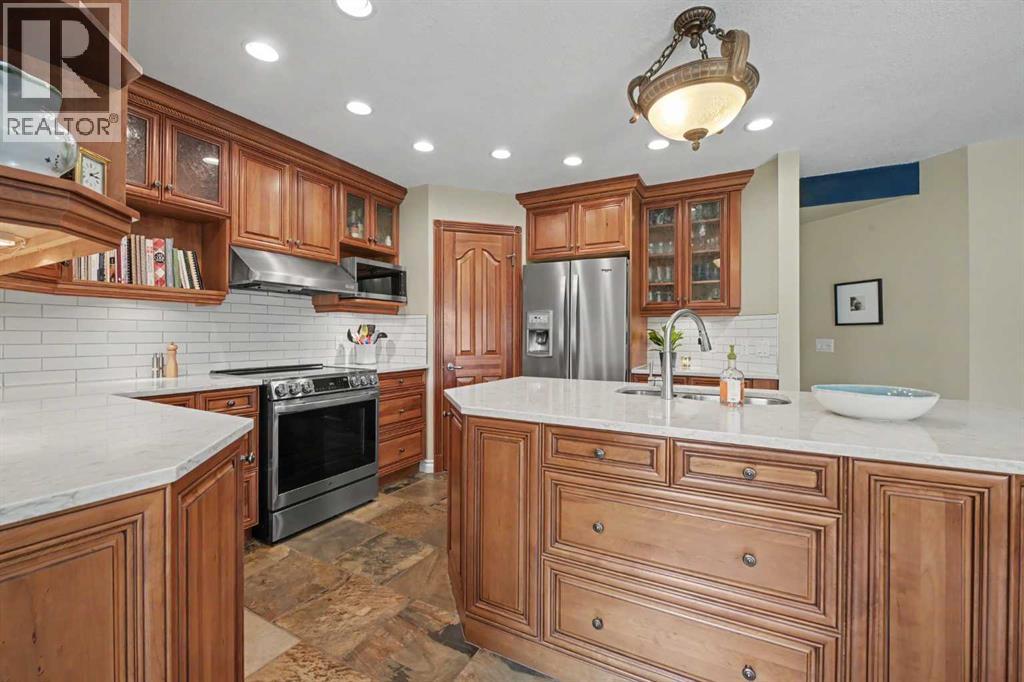 174 Woodpark Circle SW, Calgary, Alberta  T2W 6G1 - Photo 9 - A2334409