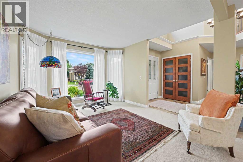 174 Woodpark Circle SW, Calgary, Alberta  T2W 6G1 - Photo 4 - A2334409
