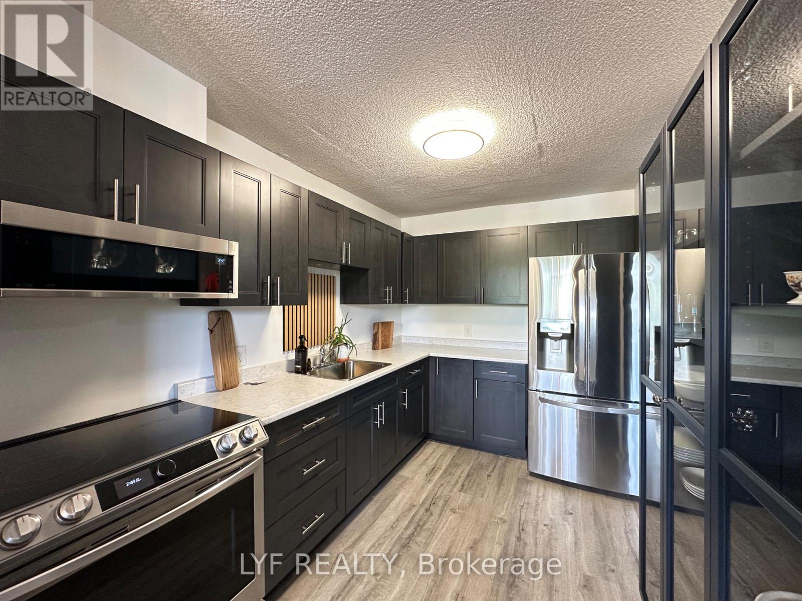 401 - 81 Millside Drive, Milton, Ontario  L9T 3X4 - Photo 5 - W13647754