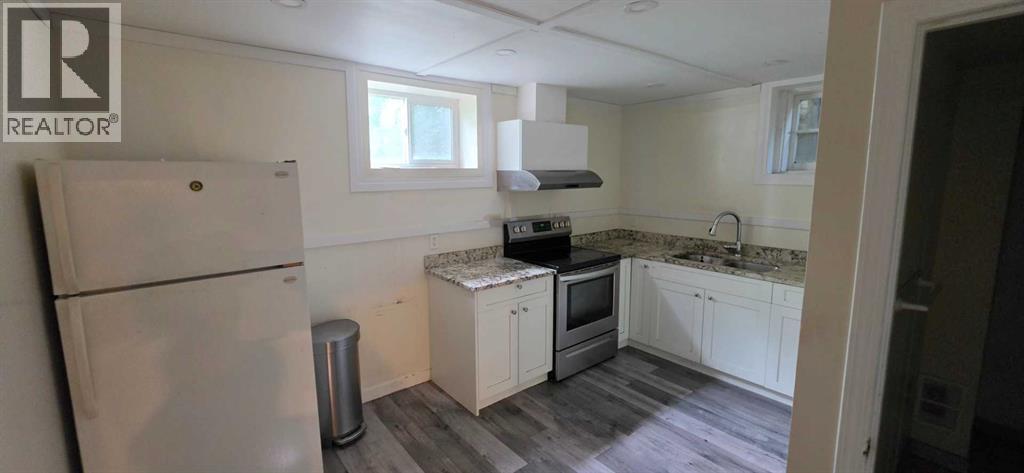 2515 Cochrane Road NW, Calgary, Alberta  T2M 4H8 - Photo 15 - A2331453