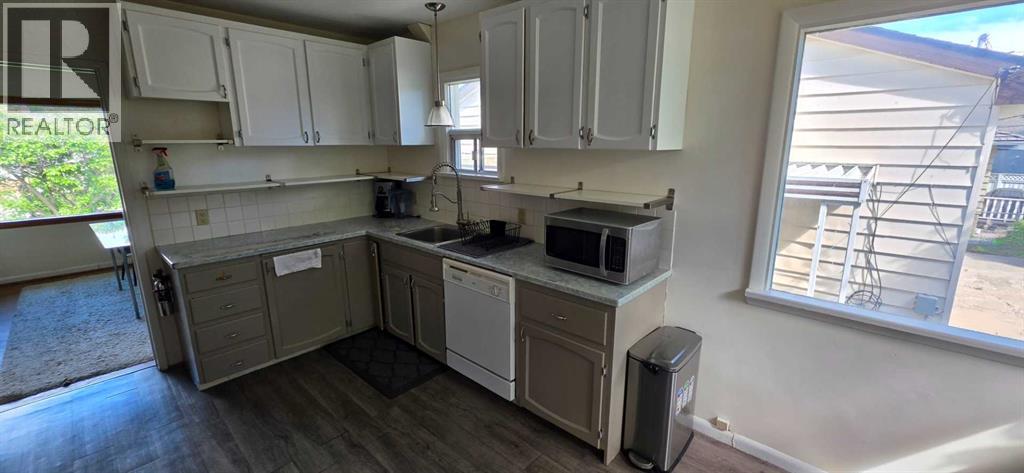 2515 Cochrane Road NW, Calgary, Alberta  T2M 4H8 - Photo 4 - A2331453