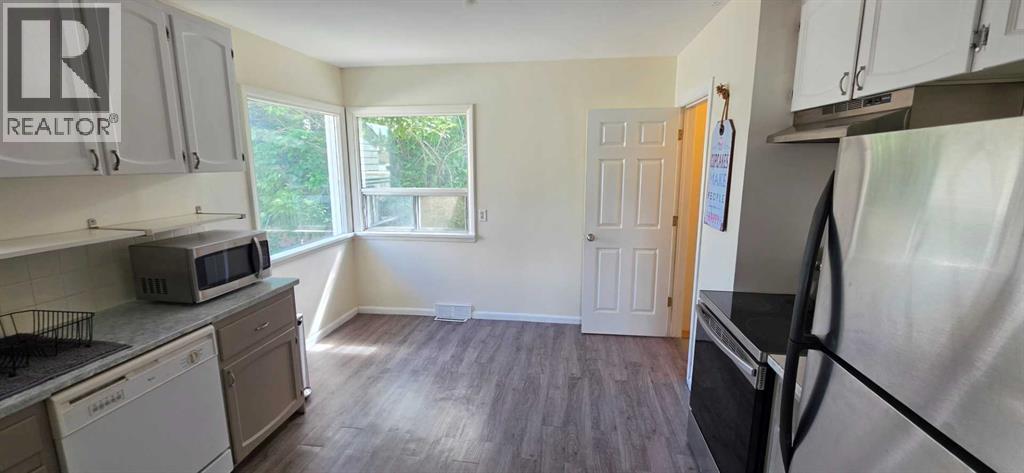 2515 Cochrane Road NW, Calgary, Alberta  T2M 4H8 - Photo 6 - A2331453