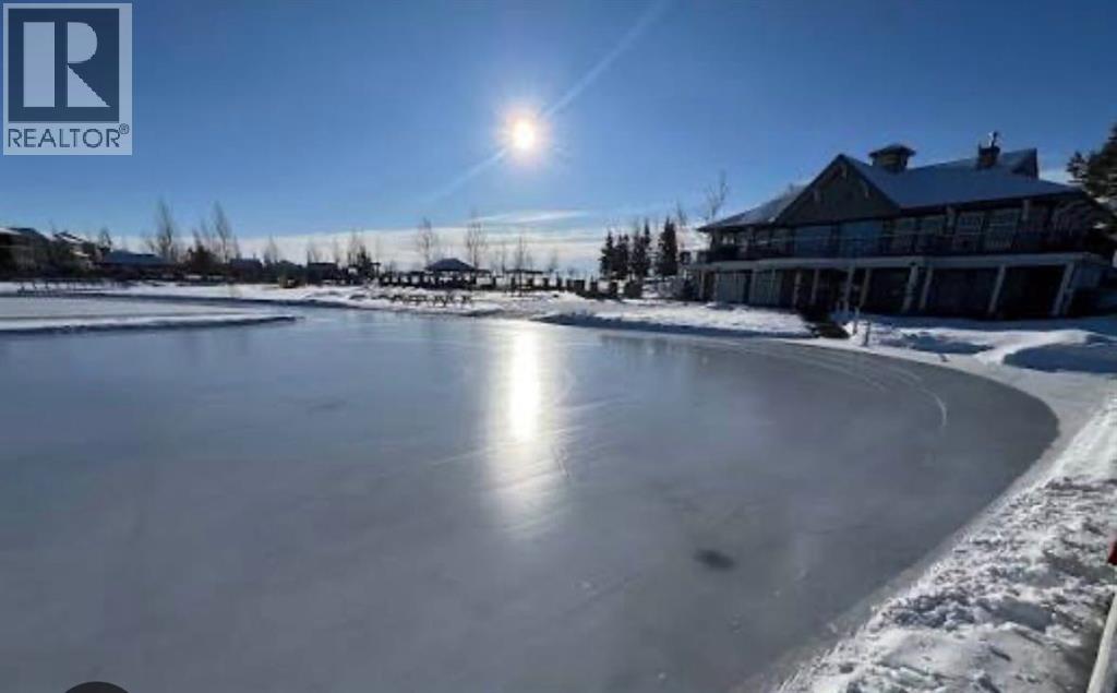 78 Crystal Shores Heights, Okotoks, Alberta  T1S 2K9 - Photo 41 - A2318337