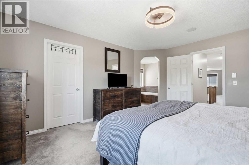 379 Cimarron Boulevard, Okotoks, Alberta  T1S 2L8 - Photo 24 - A2332833