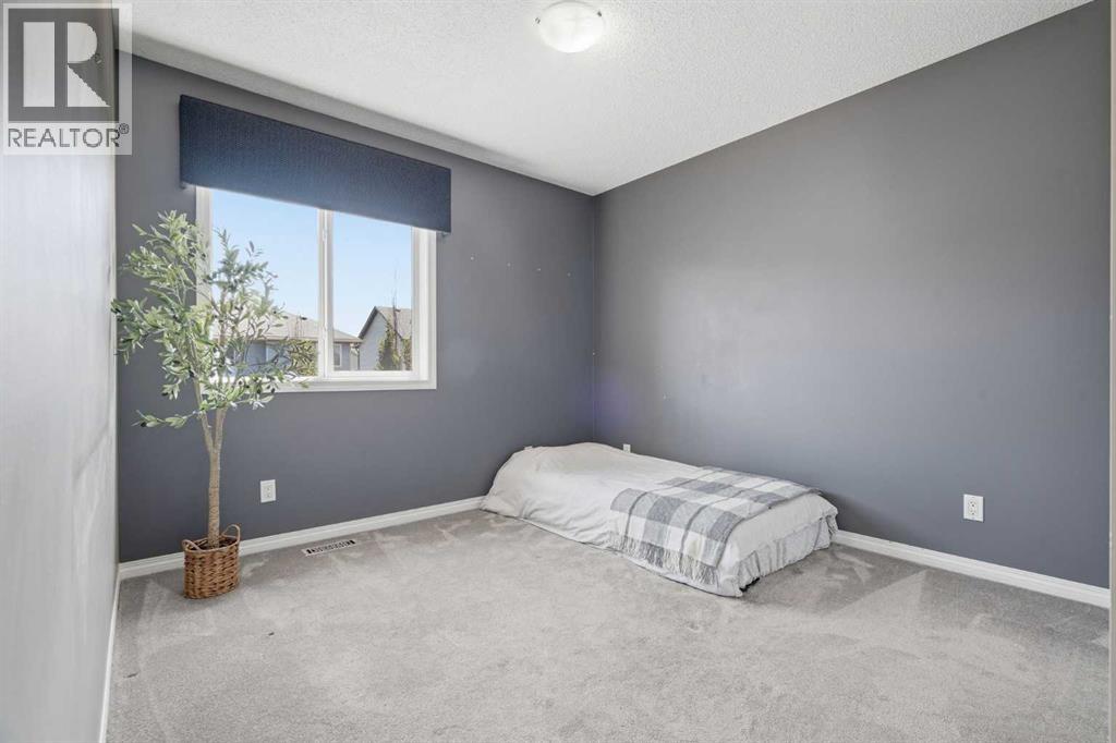 379 Cimarron Boulevard, Okotoks, Alberta  T1S 2L8 - Photo 29 - A2332833
