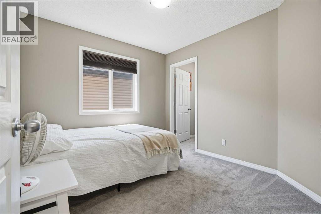 379 Cimarron Boulevard, Okotoks, Alberta  T1S 2L8 - Photo 28 - A2332833