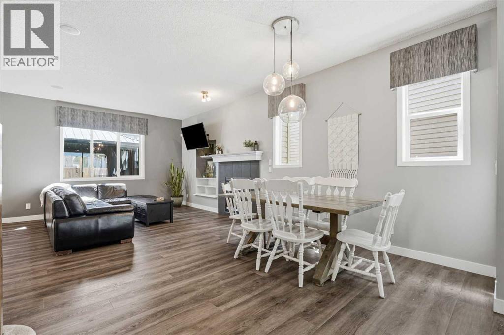 379 Cimarron Boulevard, Okotoks, Alberta  T1S 2L8 - Photo 7 - A2332833