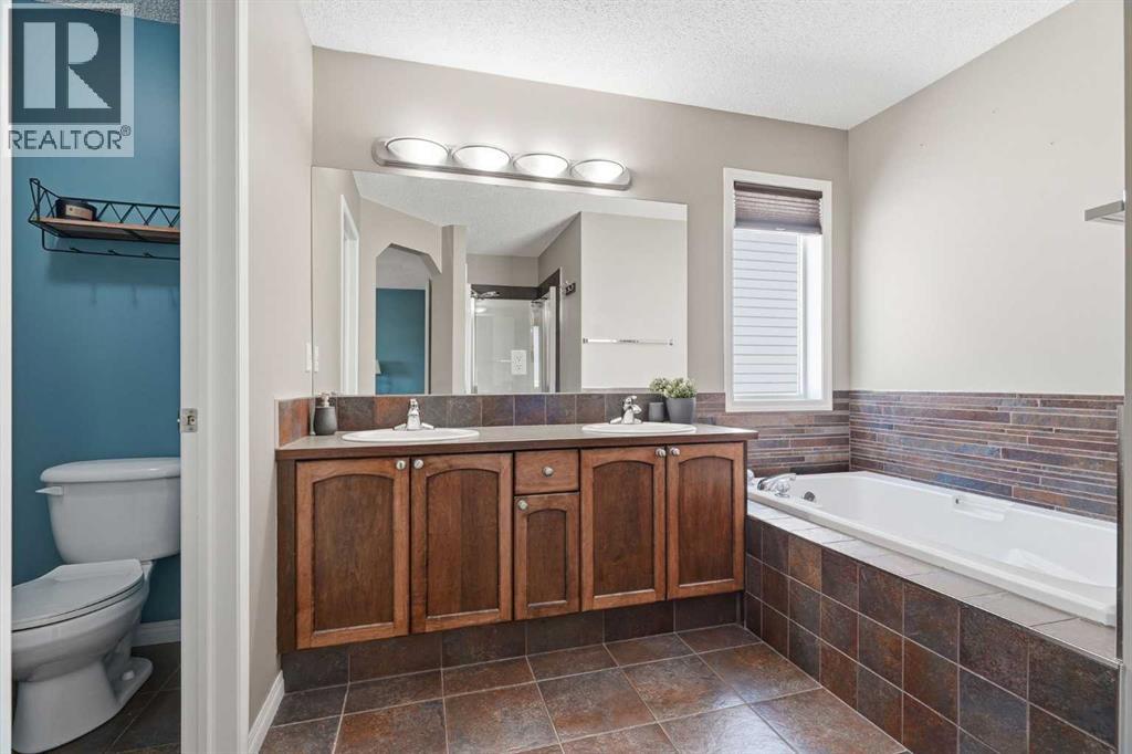 379 Cimarron Boulevard, Okotoks, Alberta  T1S 2L8 - Photo 25 - A2332833