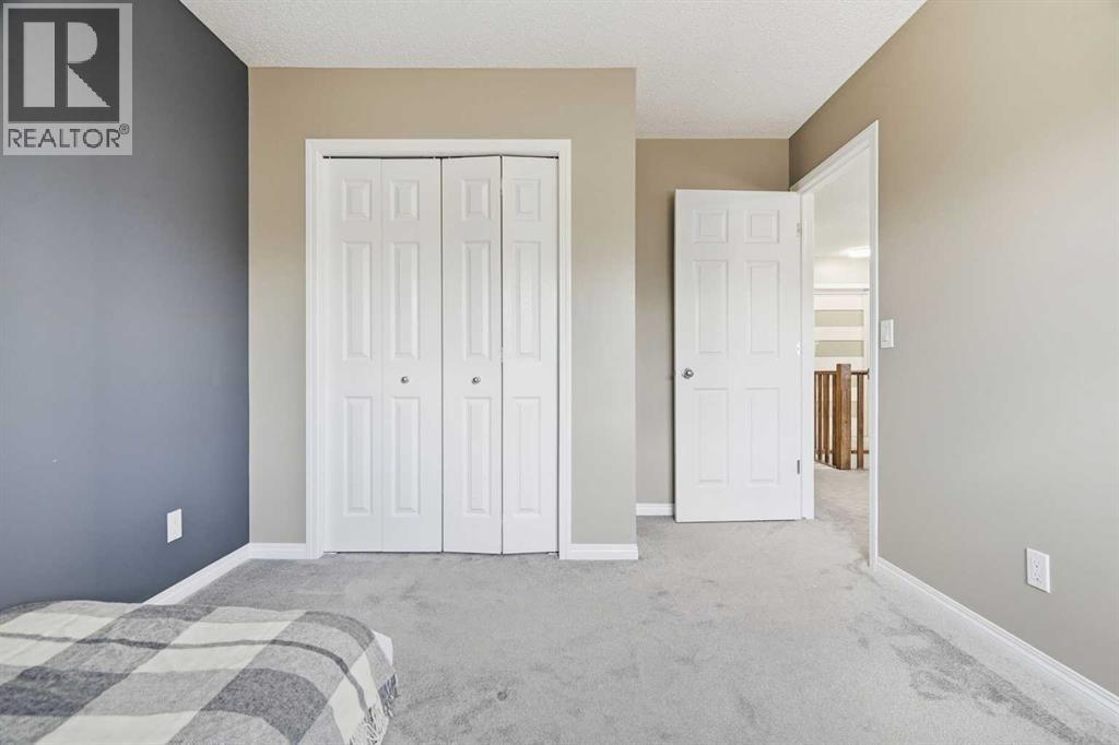 379 Cimarron Boulevard, Okotoks, Alberta  T1S 2L8 - Photo 30 - A2332833