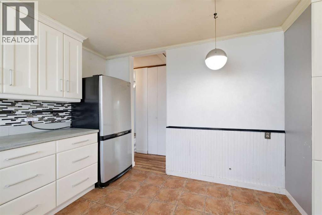 7807 Olympia Bay SE, Calgary, Alberta  T2C 1N7 - Photo 18 - A2334906