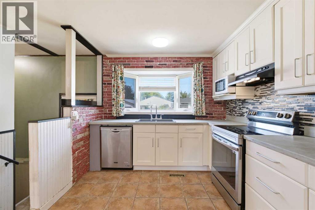 7807 Olympia Bay SE, Calgary, Alberta  T2C 1N7 - Photo 5 - A2334906