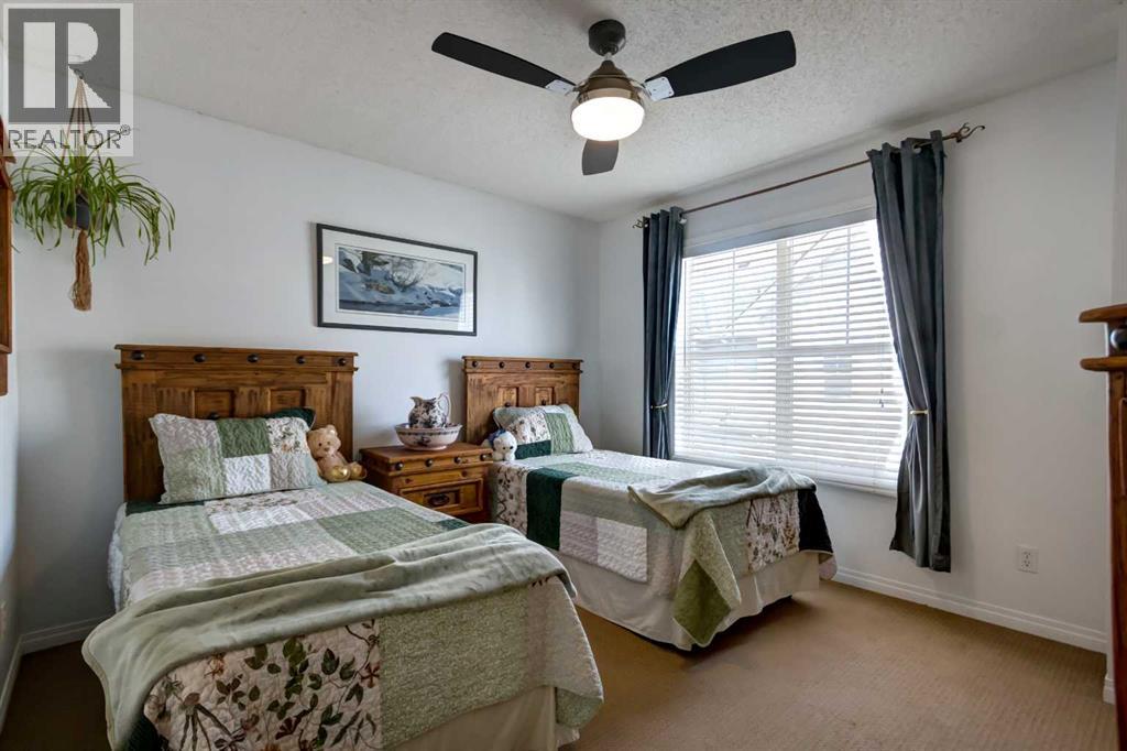 3240 New Brighton Gardens SE, Calgary, Alberta  T2Z 0A3 - Photo 18 - A2335117