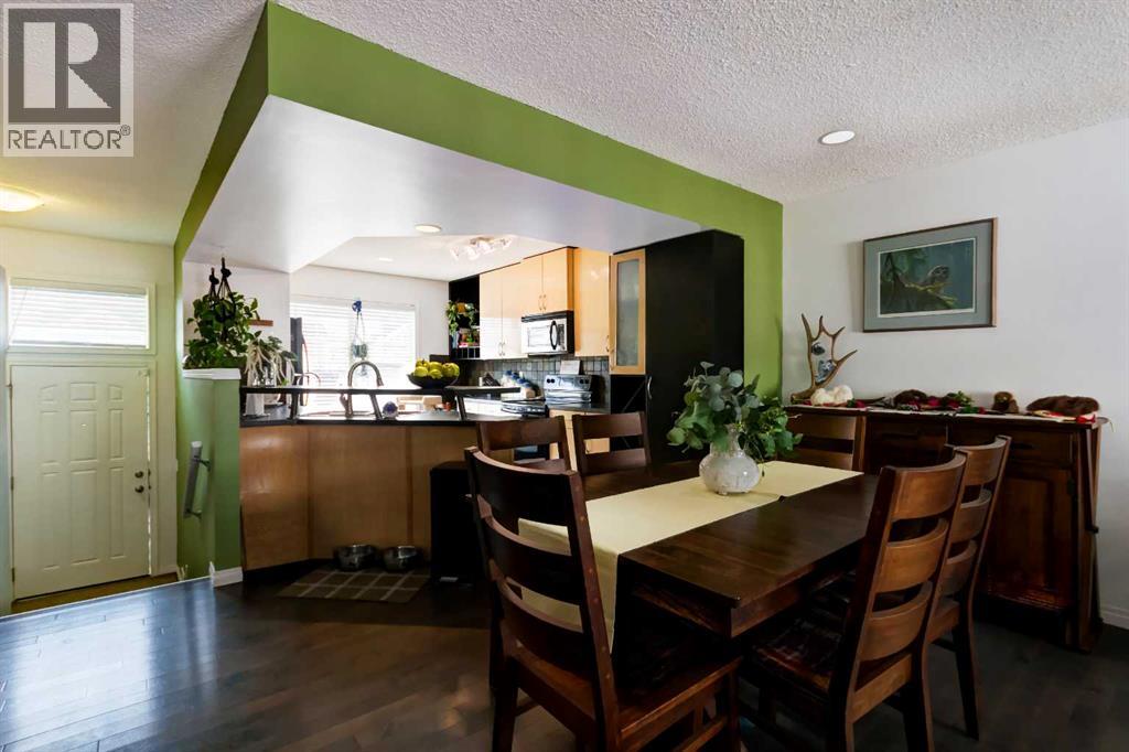3240 New Brighton Gardens SE, Calgary, Alberta  T2Z 0A3 - Photo 4 - A2335117